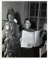 A Mary Washington student poses near a cardboard cutout of a soldier wearing a peace sign. Date: 1971 Collection: Special Collections, Simpson Library, University of Mary Washington.