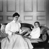 A woman and child, reading a book.jpg