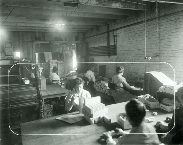 image of women packing cigarettes