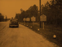 Photograph of 4 historical markers