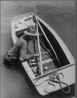 "Treading clams" Image number C1:1/09/06/023. 1939 World's Fair, Virginia Room Photograph Collection, Library of Virginia.