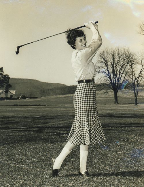 Hollins University golfer showing off her swing
