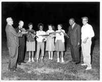 Adults with musical instruments, as part of the Negro Recreation Center programs for Parks and Recreation Division. Date:  ca. 1950. Photographer: Fred Harris, for Arlington County Parks and Recreation.