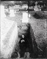 Clergyman in grave. Harry C. Mann Collection. Prints and Photographs, Special Collections, LVA. Photographer/Artist: Harry C. Mann.