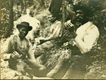 Lunchtime.  Workers laying a gas line that runs up the Mill Mountain Incline taking a lunch break.Arthur Gordan King Photograph Album. Date: 1909. Photographer/Artist: Arthur Gordan King [sic].