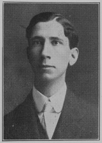 Headshot of a young white man wearing early 20th century attire.