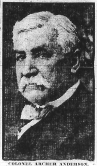Newspaper photograph of a white man with a mustache wearing late 19th century attire.