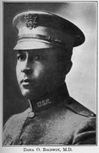 Headshot of an African American man wearing a World War 1 army unifrom.