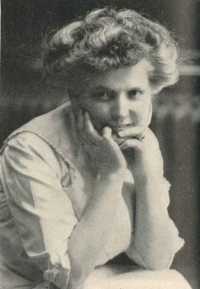 A white wearing early 20th century attire.
