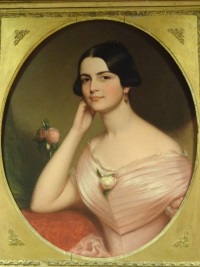 Oil portrait of a white woman wearing mid-19th century attire.