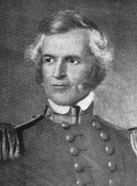 Portrait of a white man wearing a military uniform.