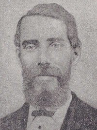 African American man with a beard and mustache wearing late 19th century attire.