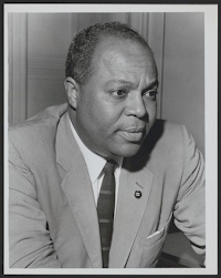African American man wearing mid-20th century attire.
