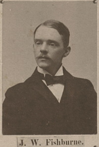 Headshot of a white man with a mustache wearing late 19th century attire.