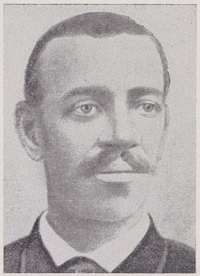 African American man with a mustache wearing late 19th century attire.