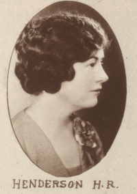 Side view portrait of a white woman wearing early 20th century attire.