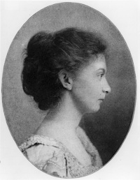 Profile photograph of a young white woman in early 20th century attire.