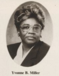 Headshot of an African American woman with glasses wearing late 20th century attire.