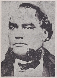 African American man with mutton chop sideburns wearing late 19th century attire.