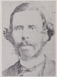 African American man with a mustache and sideburns wearing late 19th century attire.