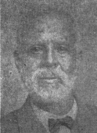 African American man with a beard and mustache wearing late 19th century attire.
