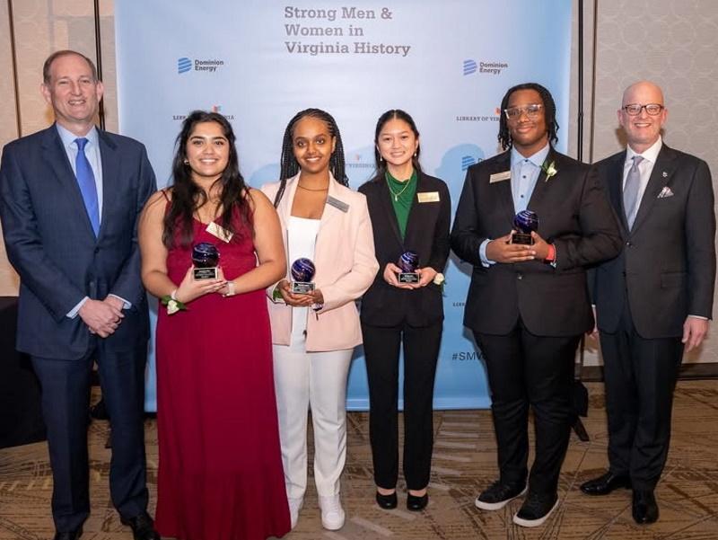 2024 Strong Men & Women in Virginia History Student Contest finalists four high school students holding awards standing in a row with an adult man at each end