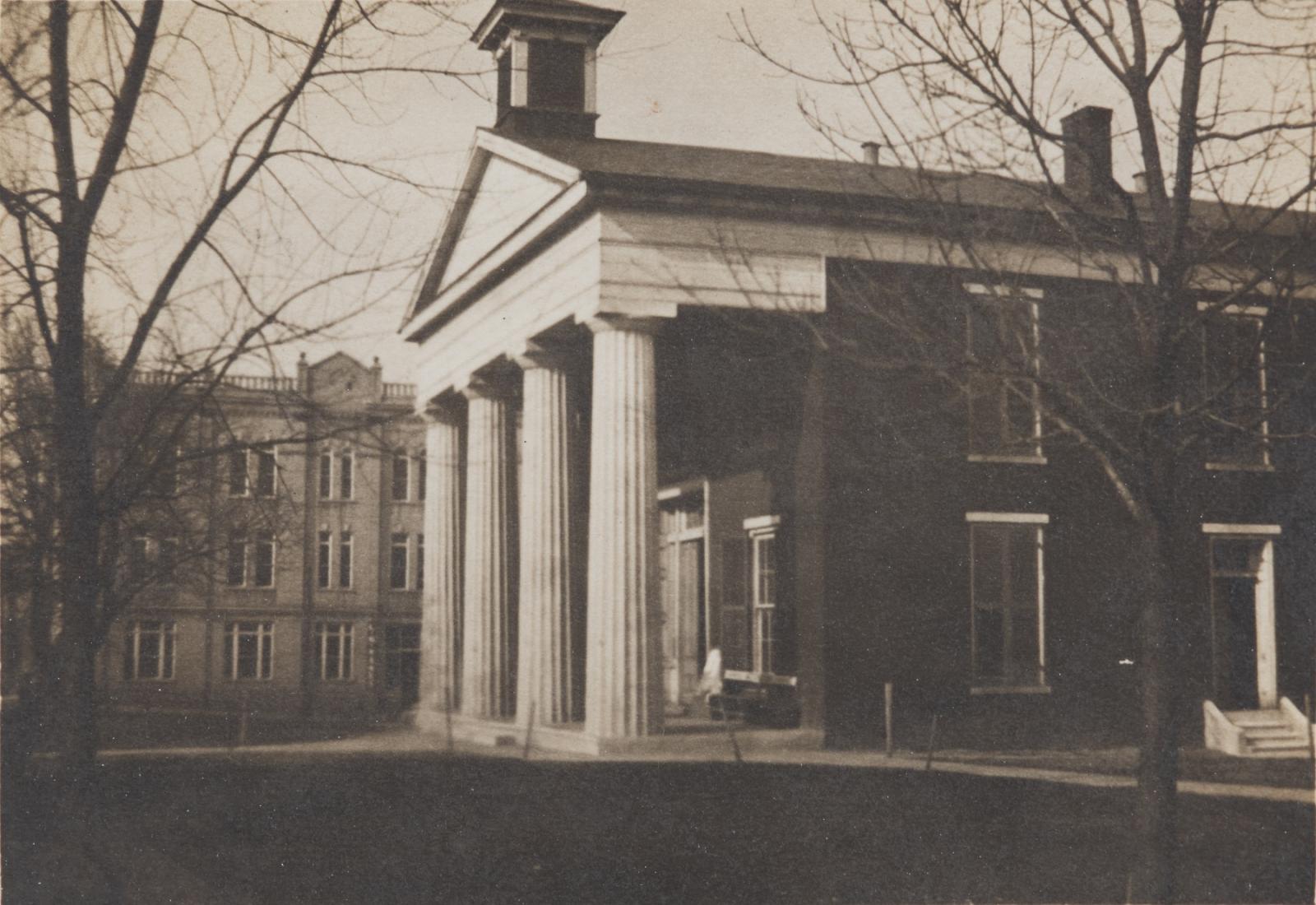 Morgan Robinson_ Court House Black and white photography of historical court house. photography take from the side of the building. While columns and clock tower in view