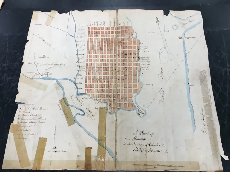 drawn map of alexandria, show folds and tape along tears