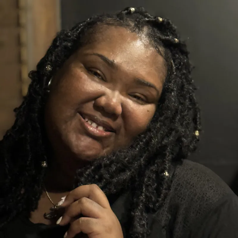 Photograph of T Threat.