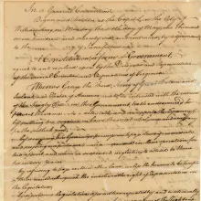 Black handwriting on tan parchment