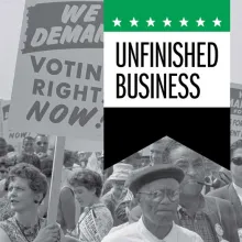 crowd of people with one holding a sign that says We Demand Voting Rights Now