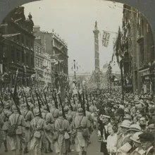 WWI soldiers march in a parade in London